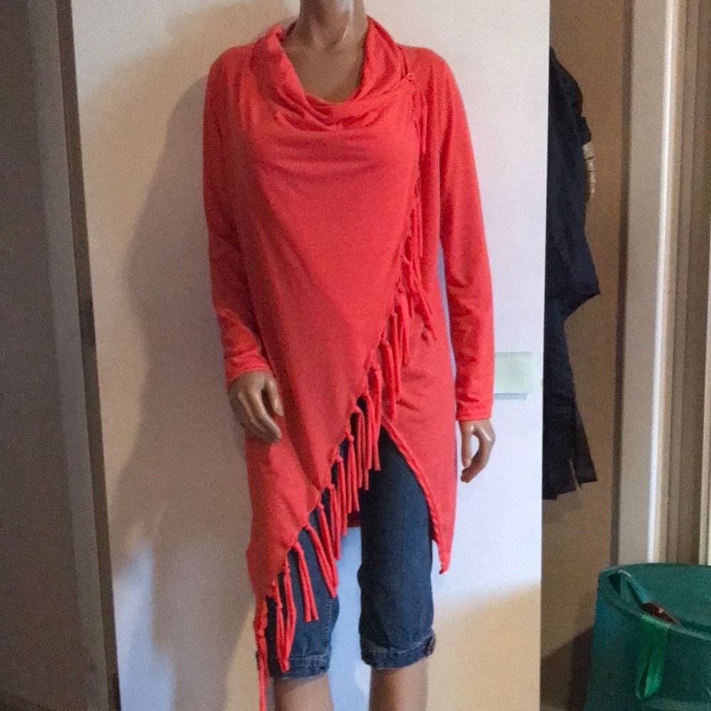 Semi-wrap around sweater. Tag says an XL but I’d say more of a M/L.